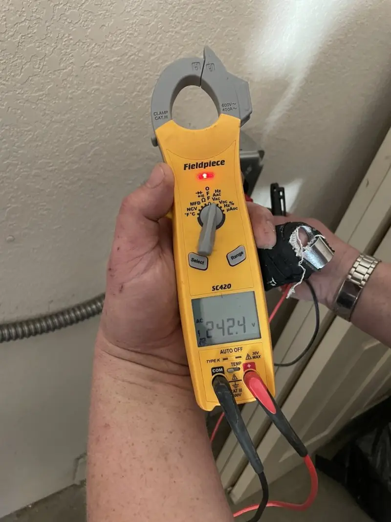 Voltage testing with clamp meter during Hot Tub / Pool Electrical Wiring in Ruston